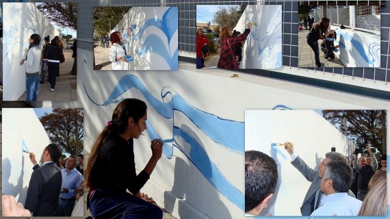 La pintura del mural de la Escuela Nº 175 General San Martín es realizado por alumnos y docentes.